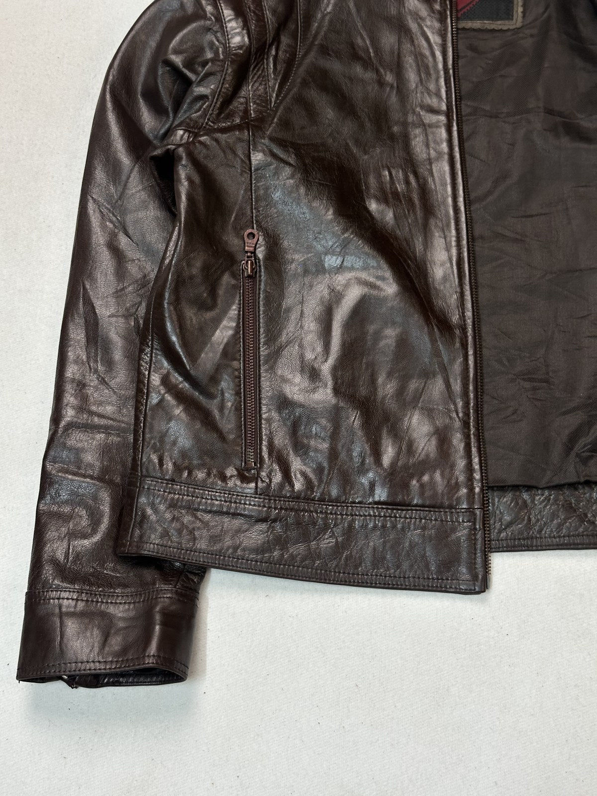 Front zip and pocket detail on the size M burgundy leather biker jacket