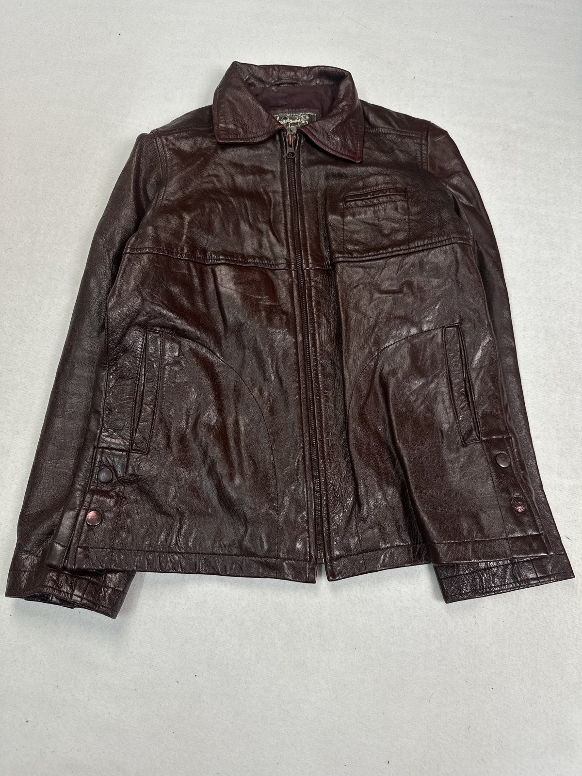 Lining of the size S burgundy leather biker jacket, front opened out