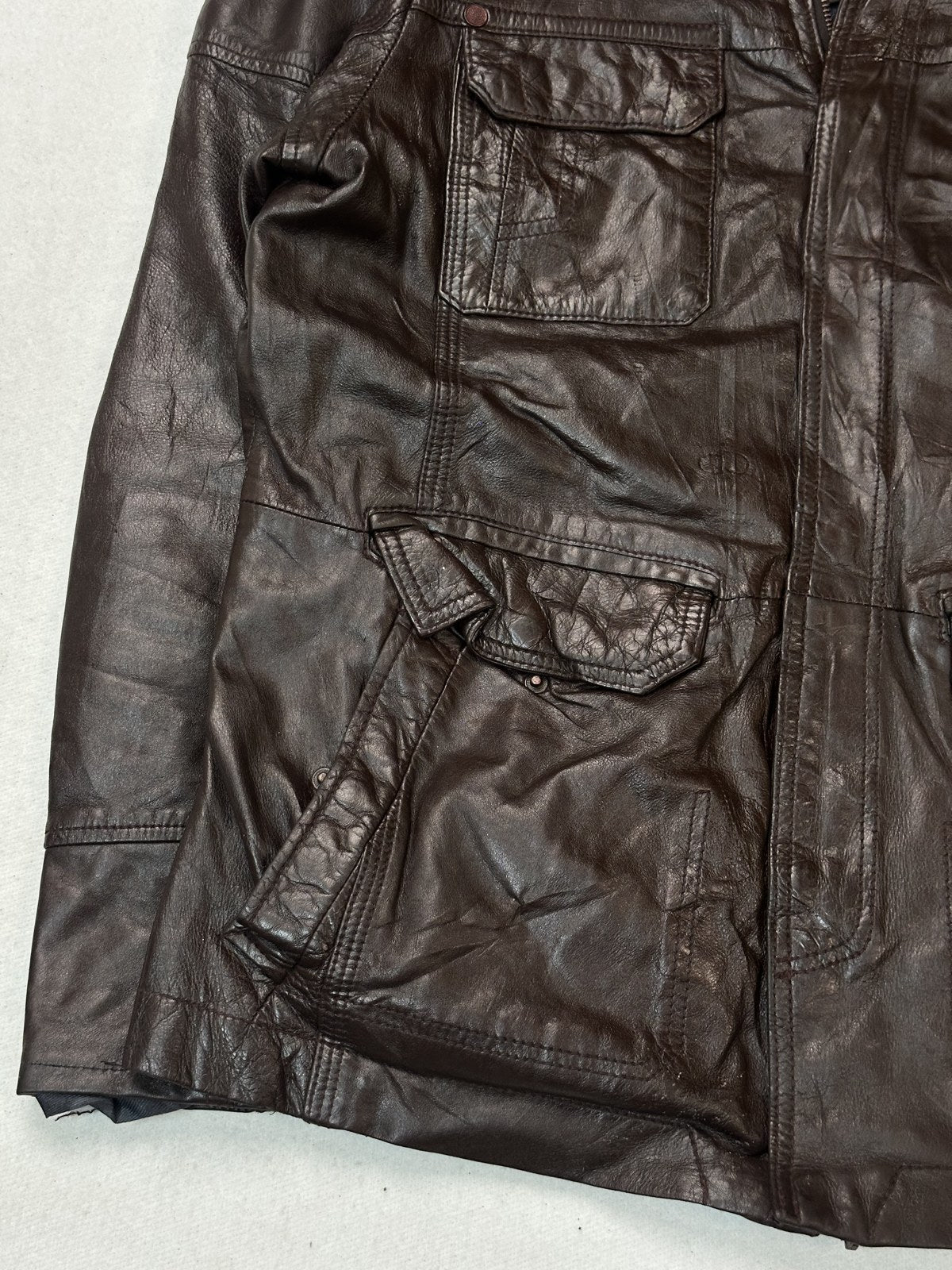 Stand collar and neck opening on the size L burgundy field pocket bomber