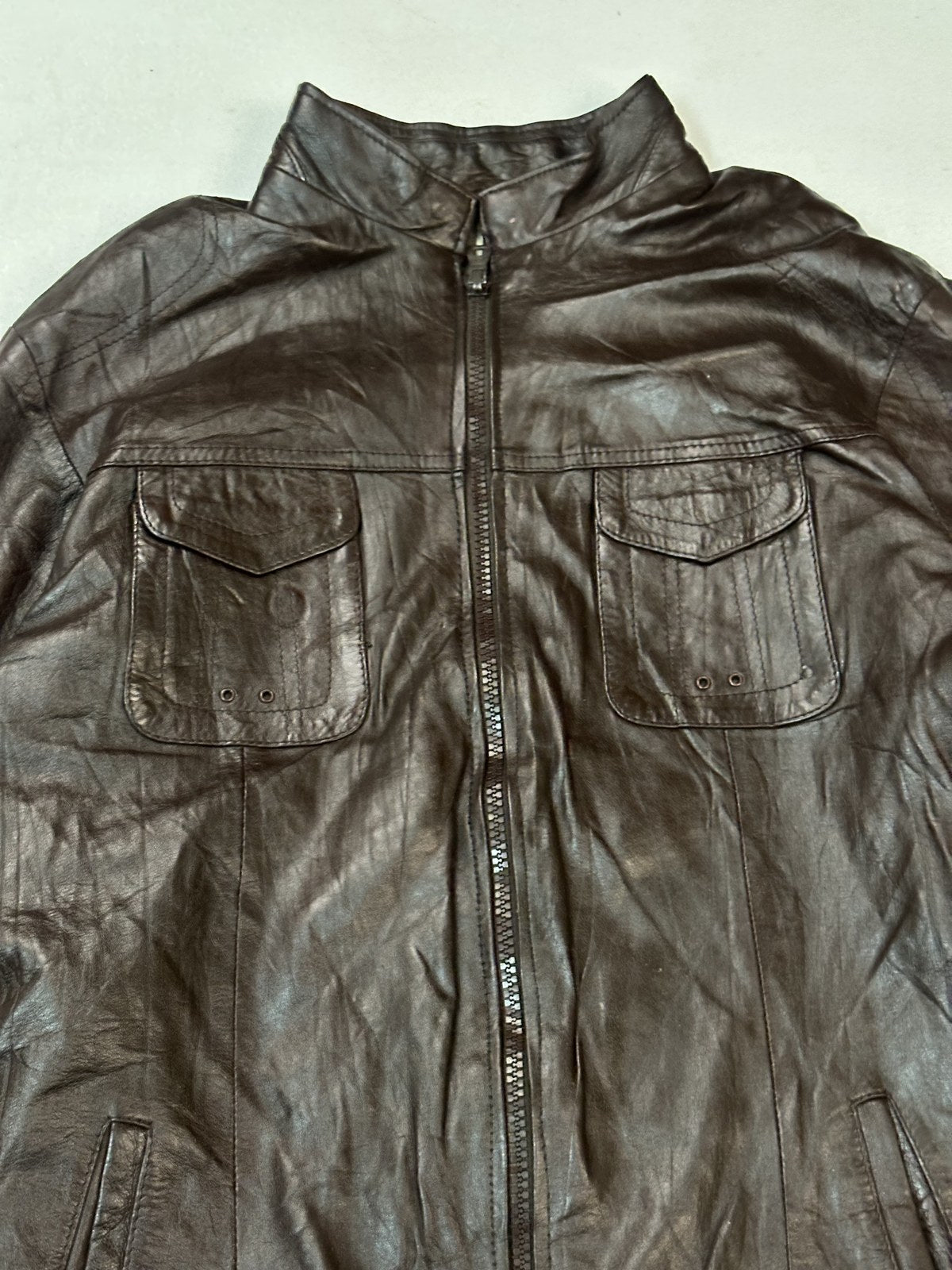 Interior of the plain front burgundy bomber jacket with the panels opened out