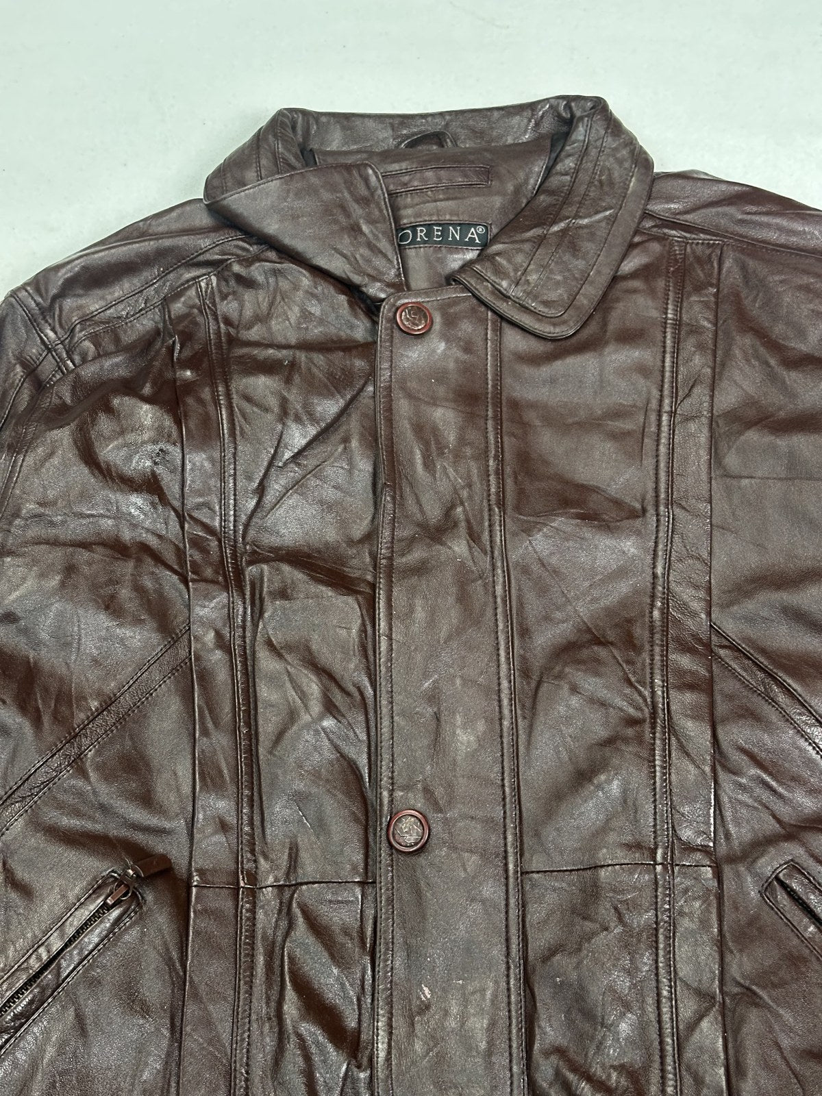 Back of the XXL burgundy bomber jacket showing the roomy body and straight hem