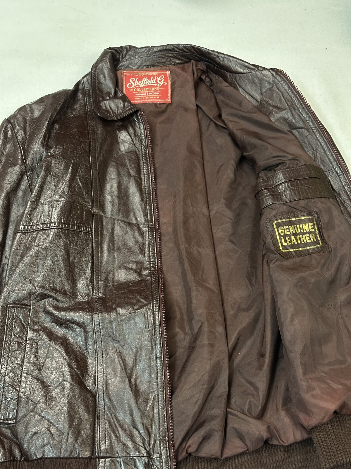 Interior lining of the band collar burgundy leather bomber jacket