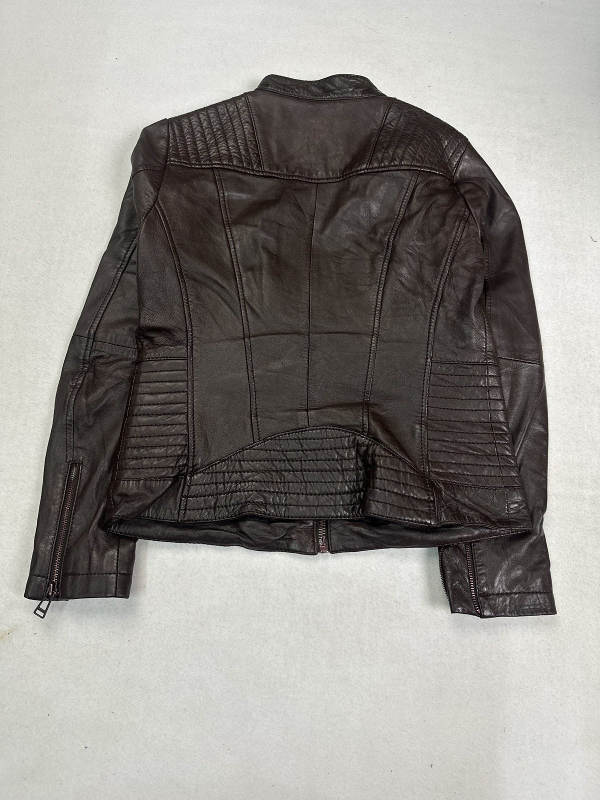 Back of the size S burgundy cafe racer shown flat
