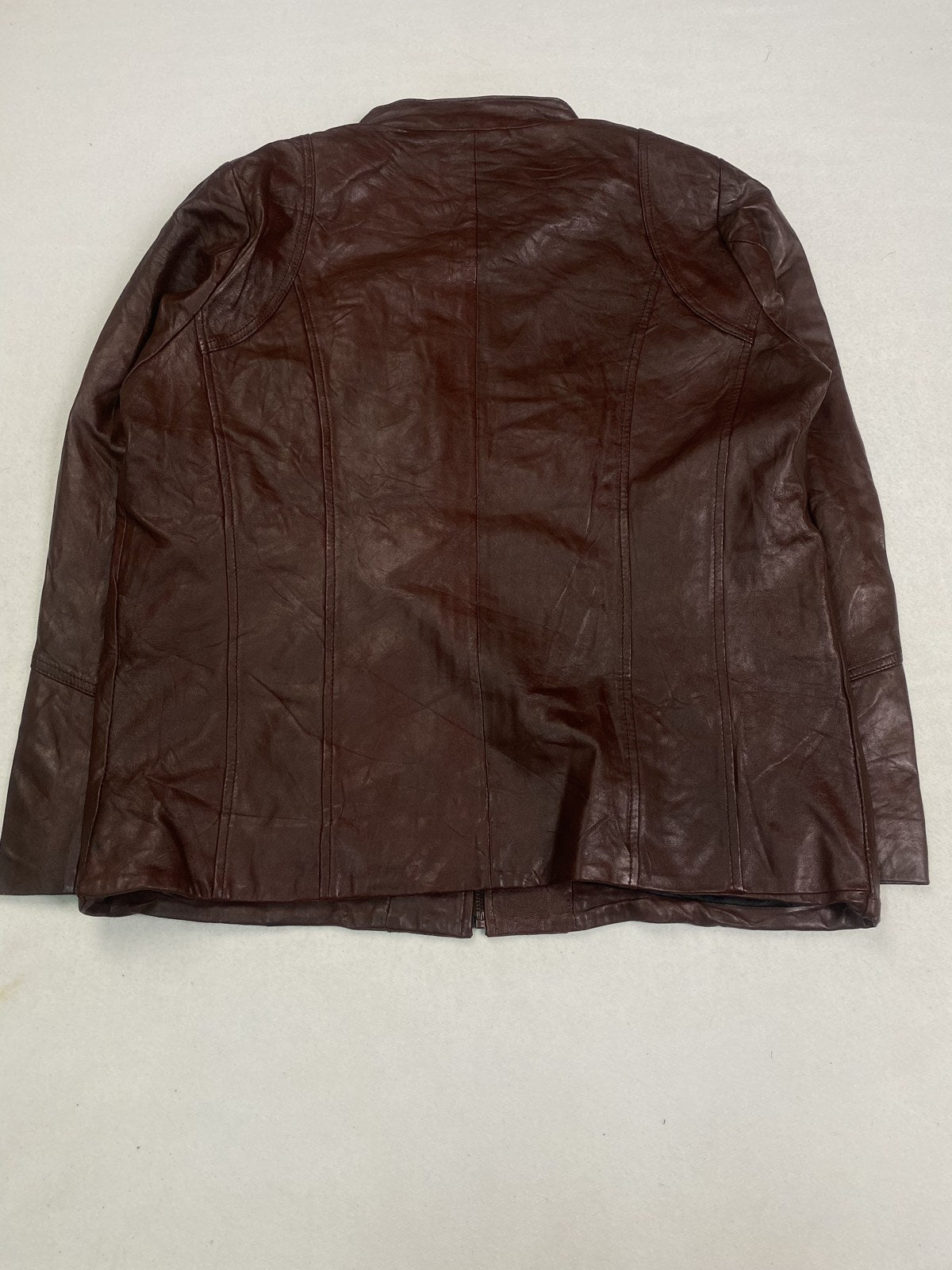 Back of the size L burgundy cafe racer shown flat