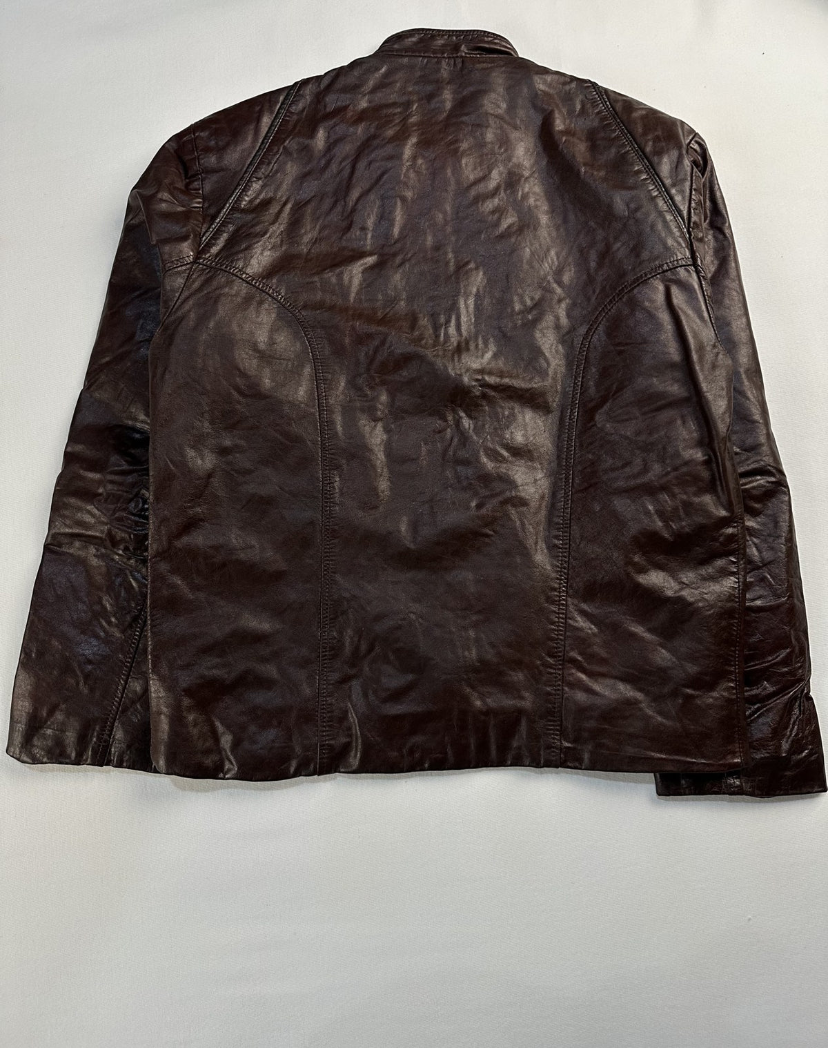 Back of the size L burgundy cafe racer shown flat