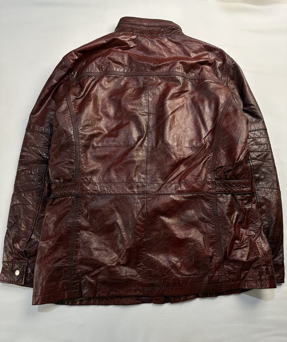 Back of the size XL burgundy field jacket shown flat