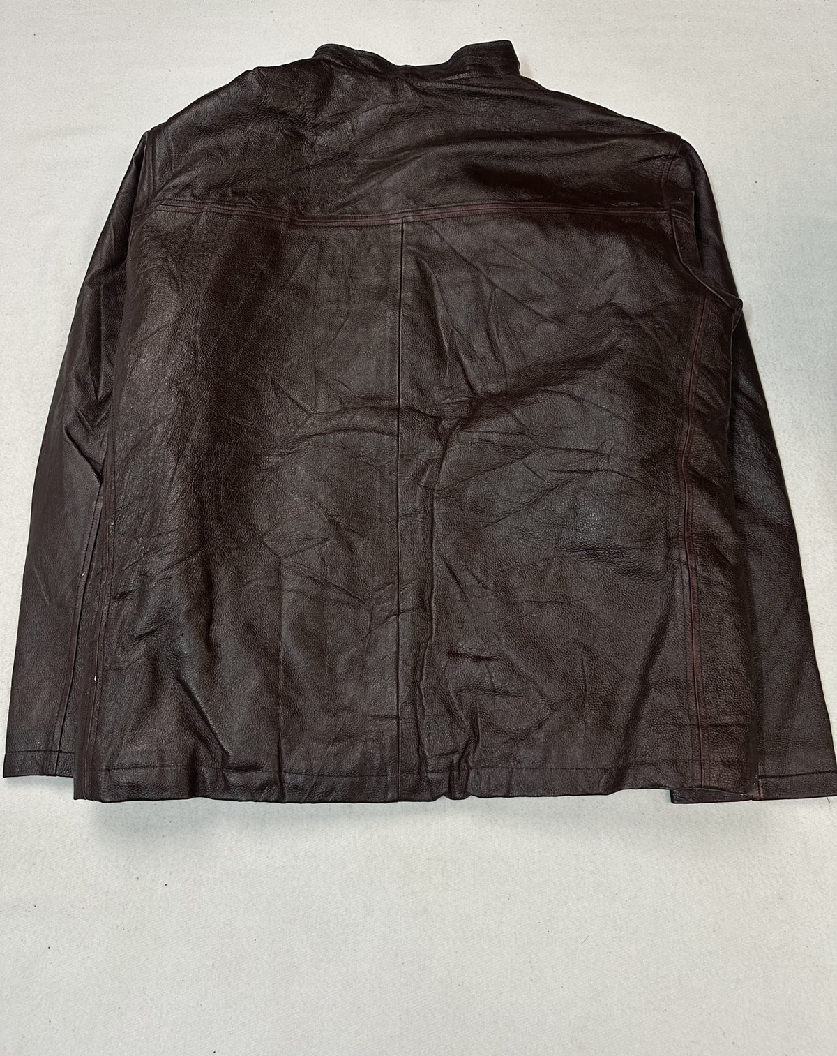 Rear view of the burgundy size L flight jacket showing the full width of the back panel