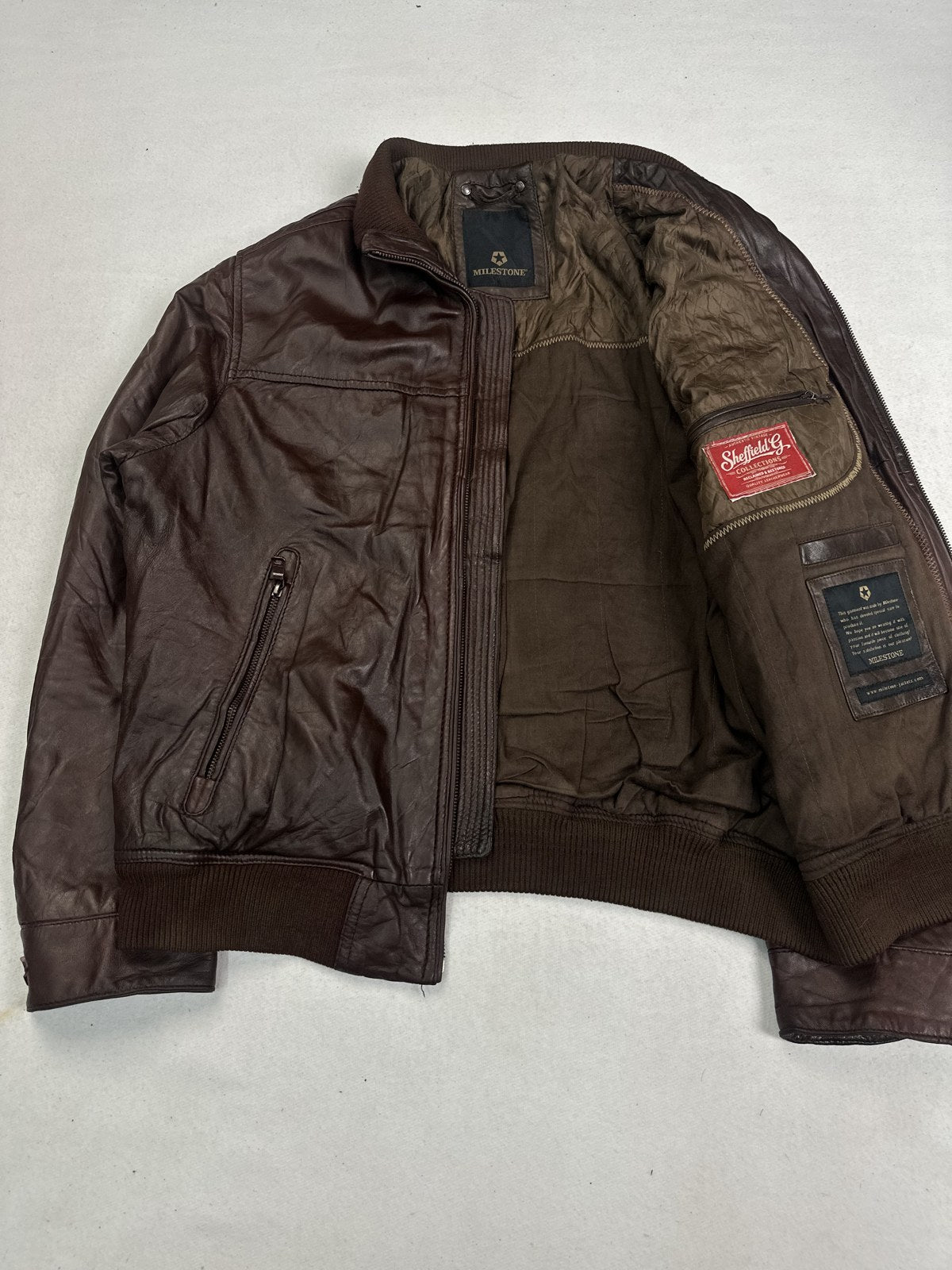 Olive lining inside the corduroy collar burgundy flight jacket