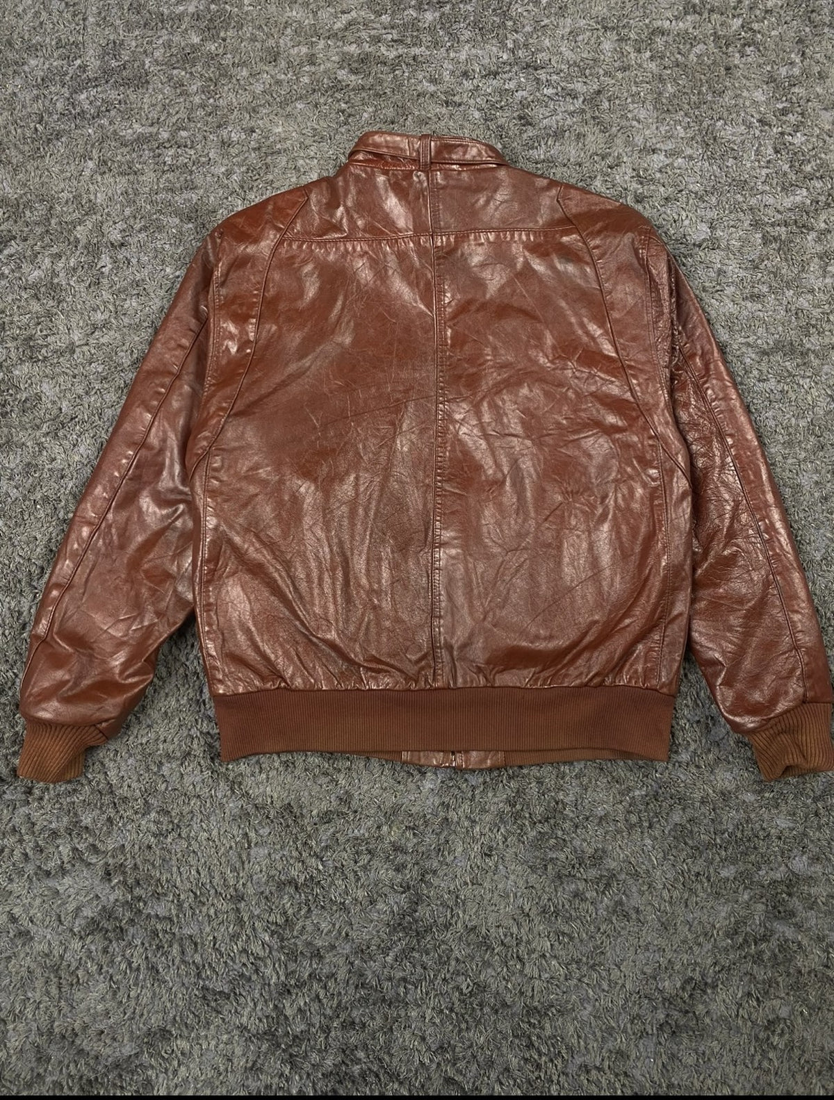Back of the size M burgundy flight jacket showing the classic cut
