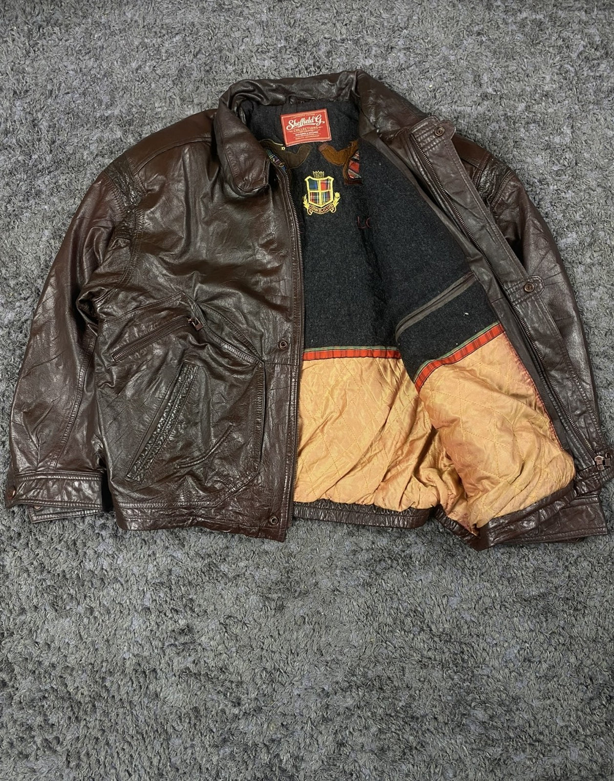 Gold quilted lining inside the size XXL burgundy flight jacket