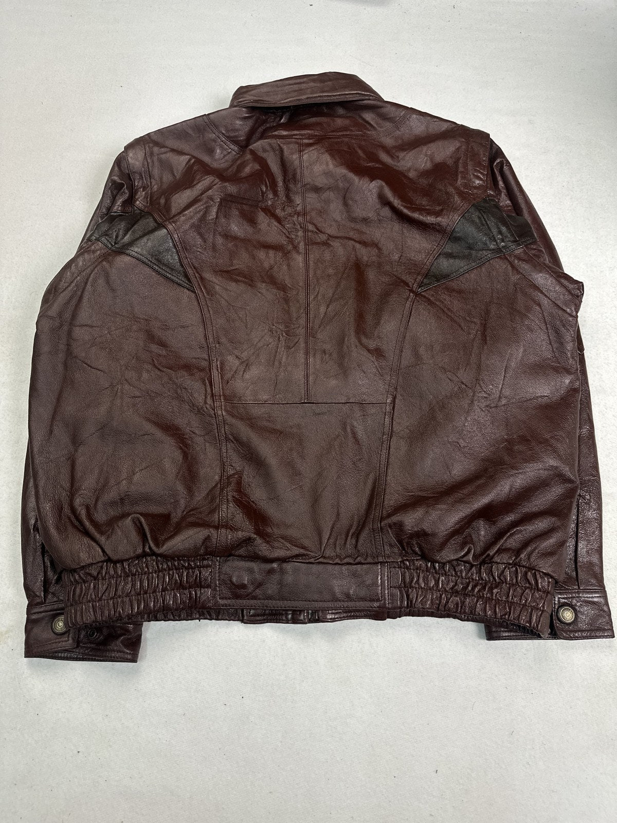 Back of the size XXL burgundy harrington shown flat
