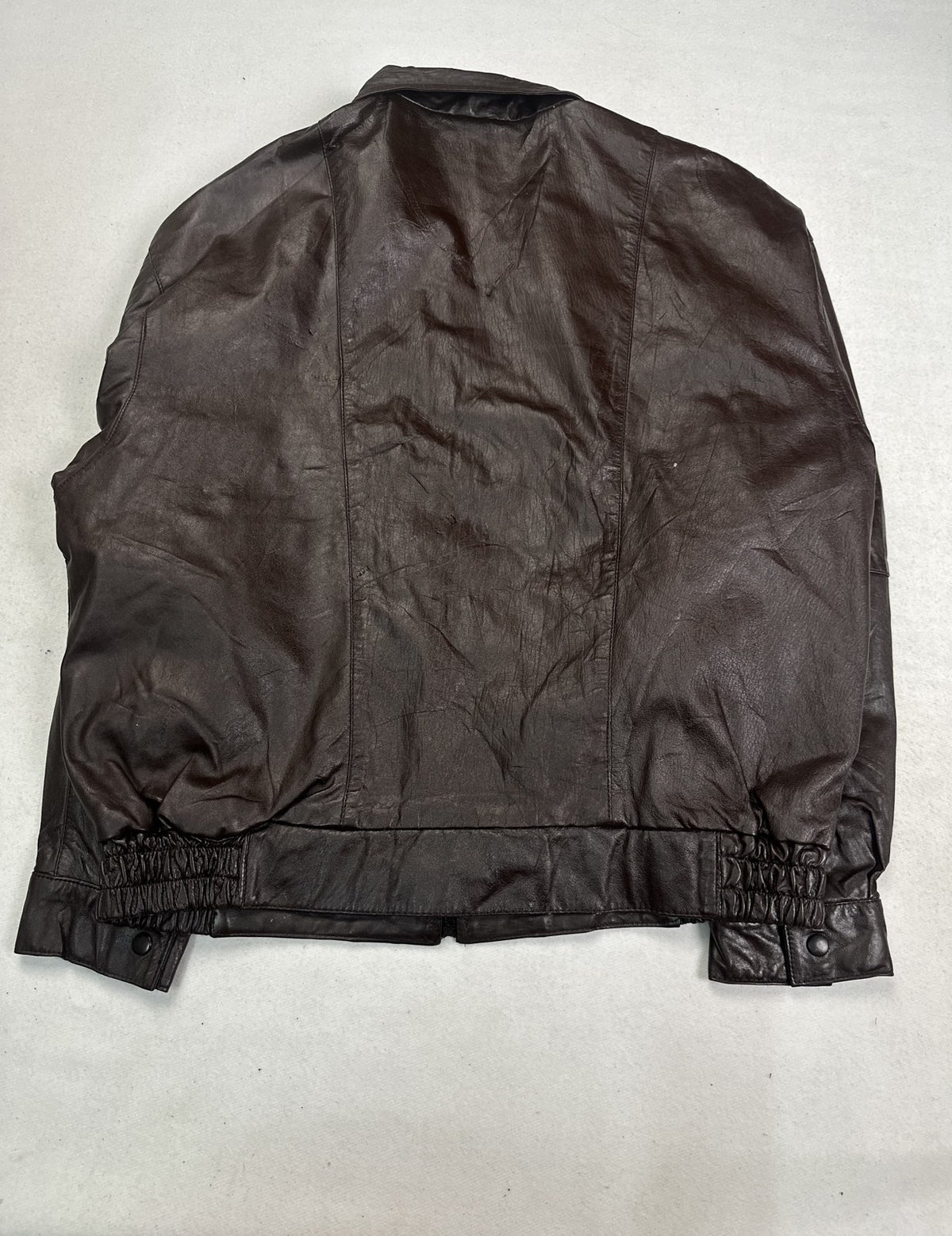 Back of the size XL burgundy harrington shown flat