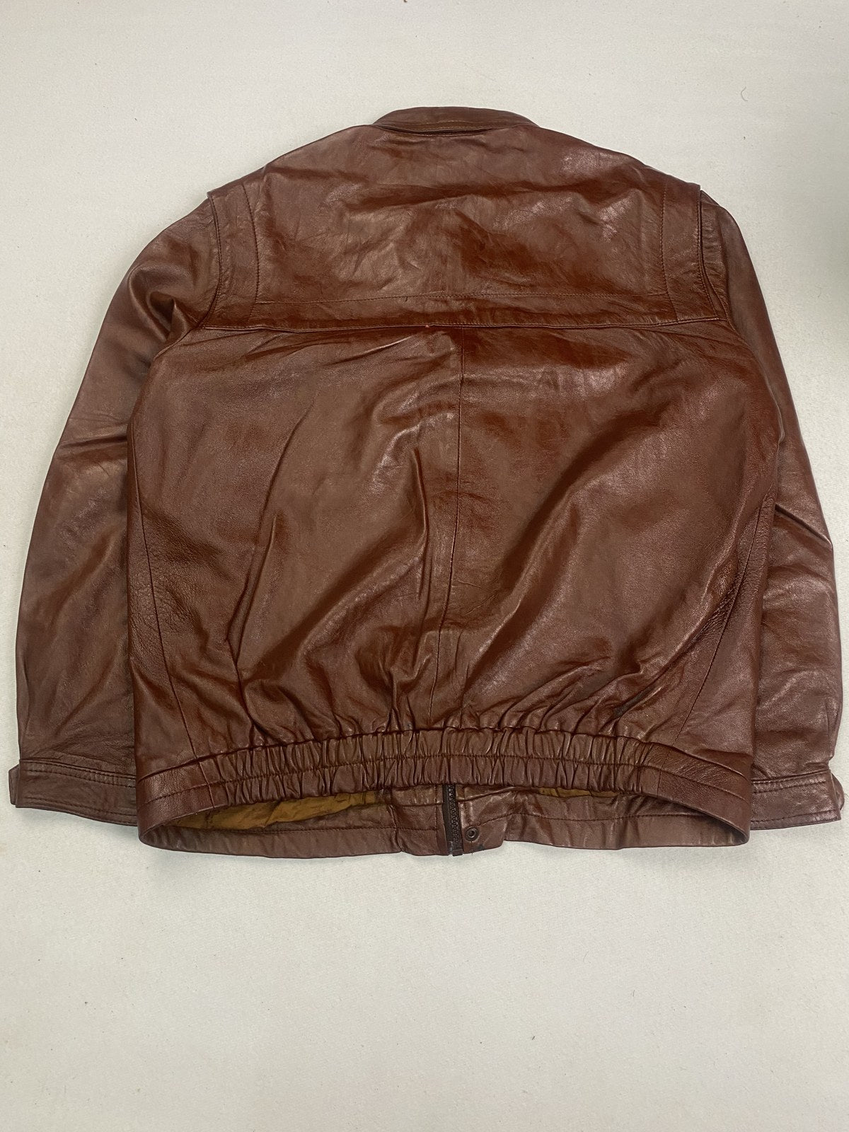 Back of the size XL burgundy harrington shown flat