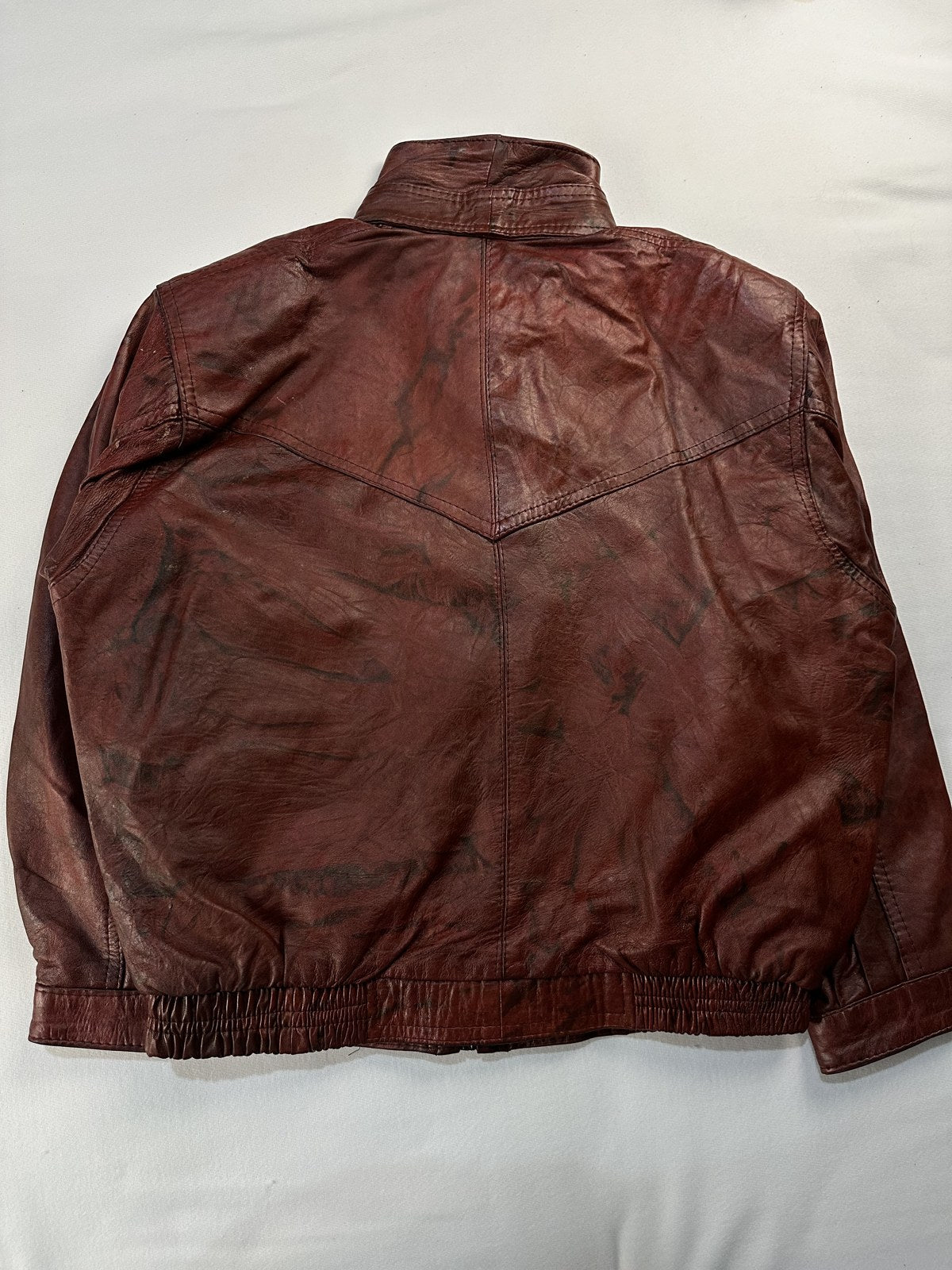 Back of the size XXL burgundy harrington with its chevron yoke