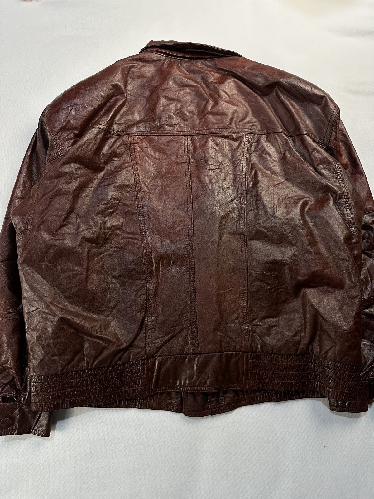Back of the size XXL burgundy harrington shown flat