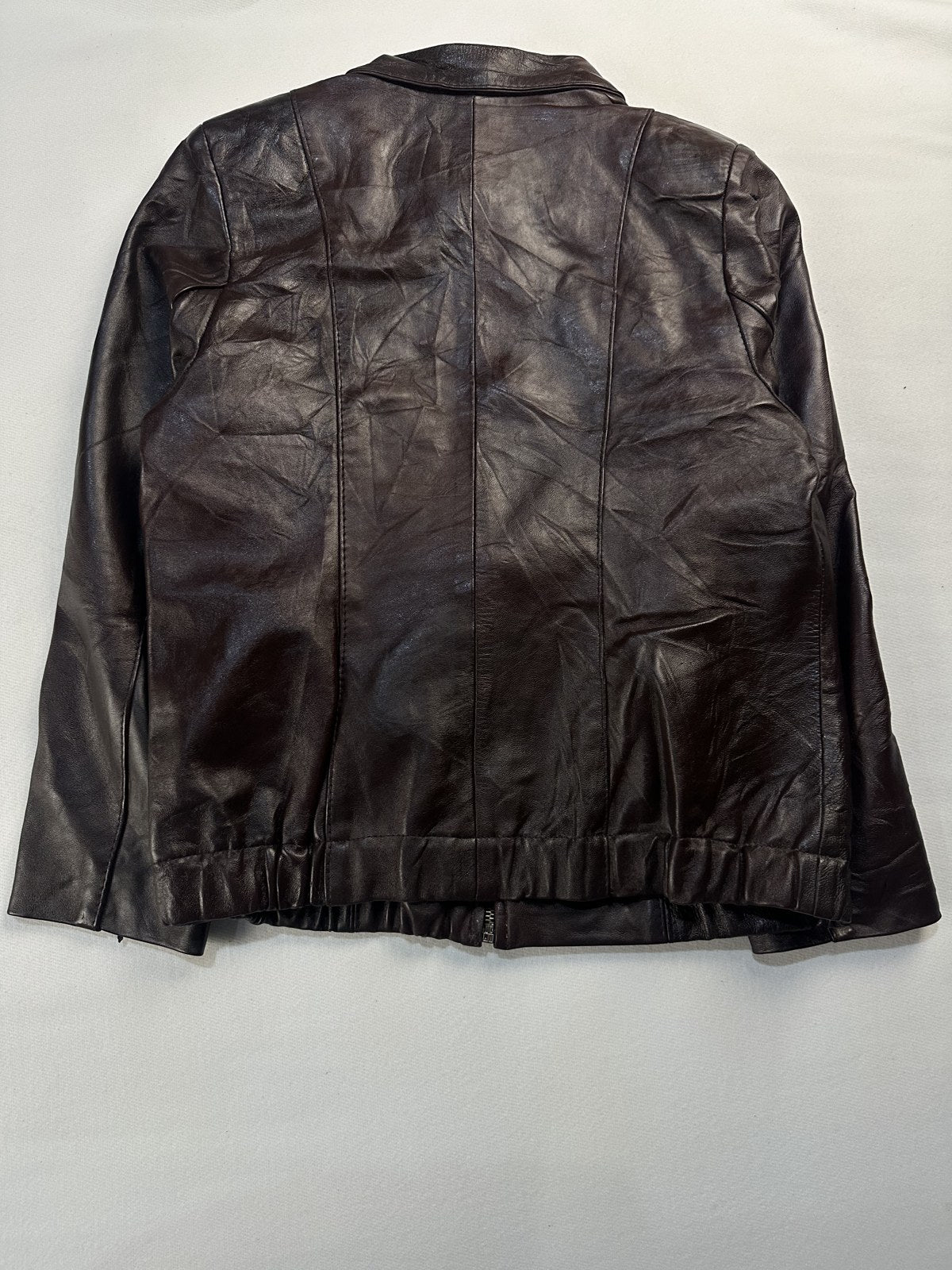 Back of the size M burgundy harrington above its shirred waistband