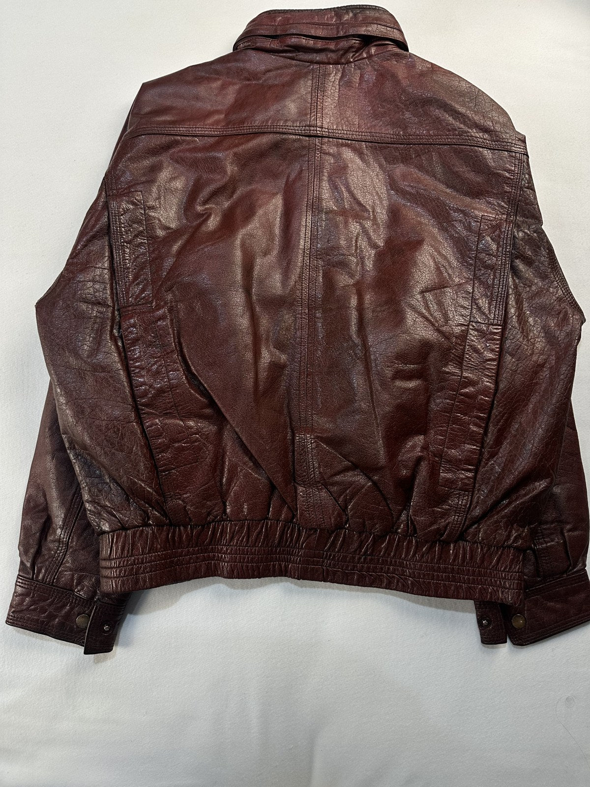 Back of the size XL burgundy harrington shown flat