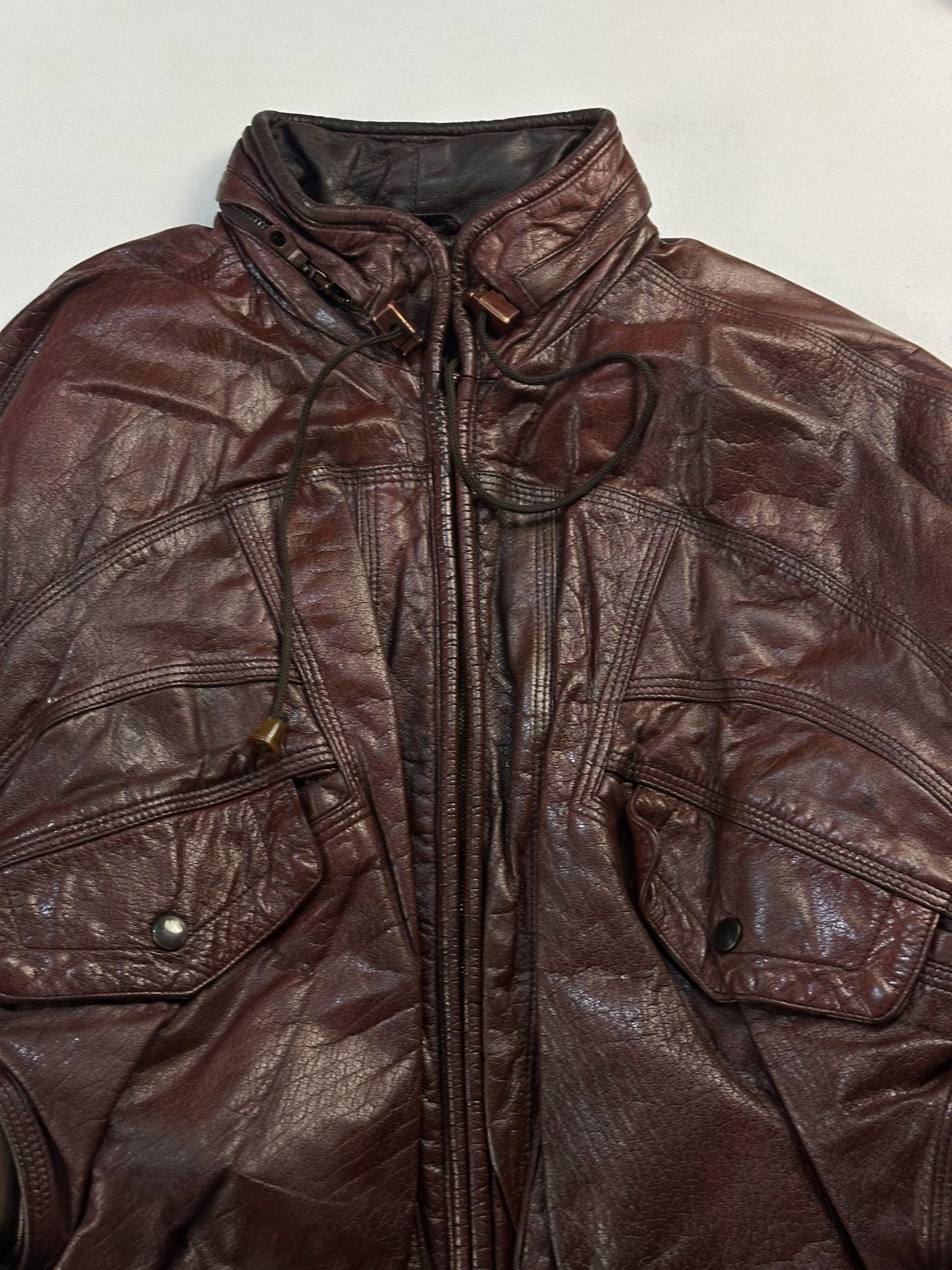 Drawcord collar at the neck of the burgundy leather harrington