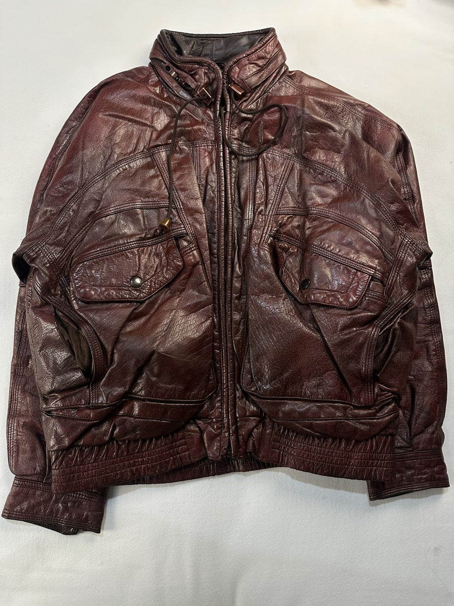 Burgundy leather harrington jacket in size XL laid flat from the front