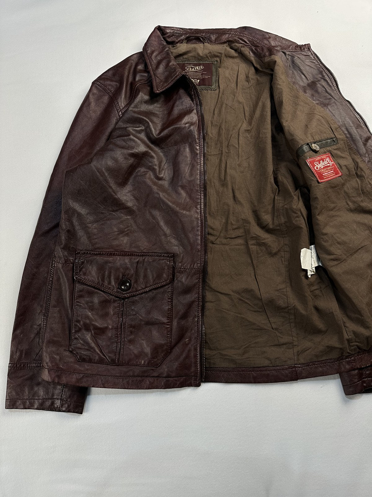 Trucker jacket opened out to show the lining inside