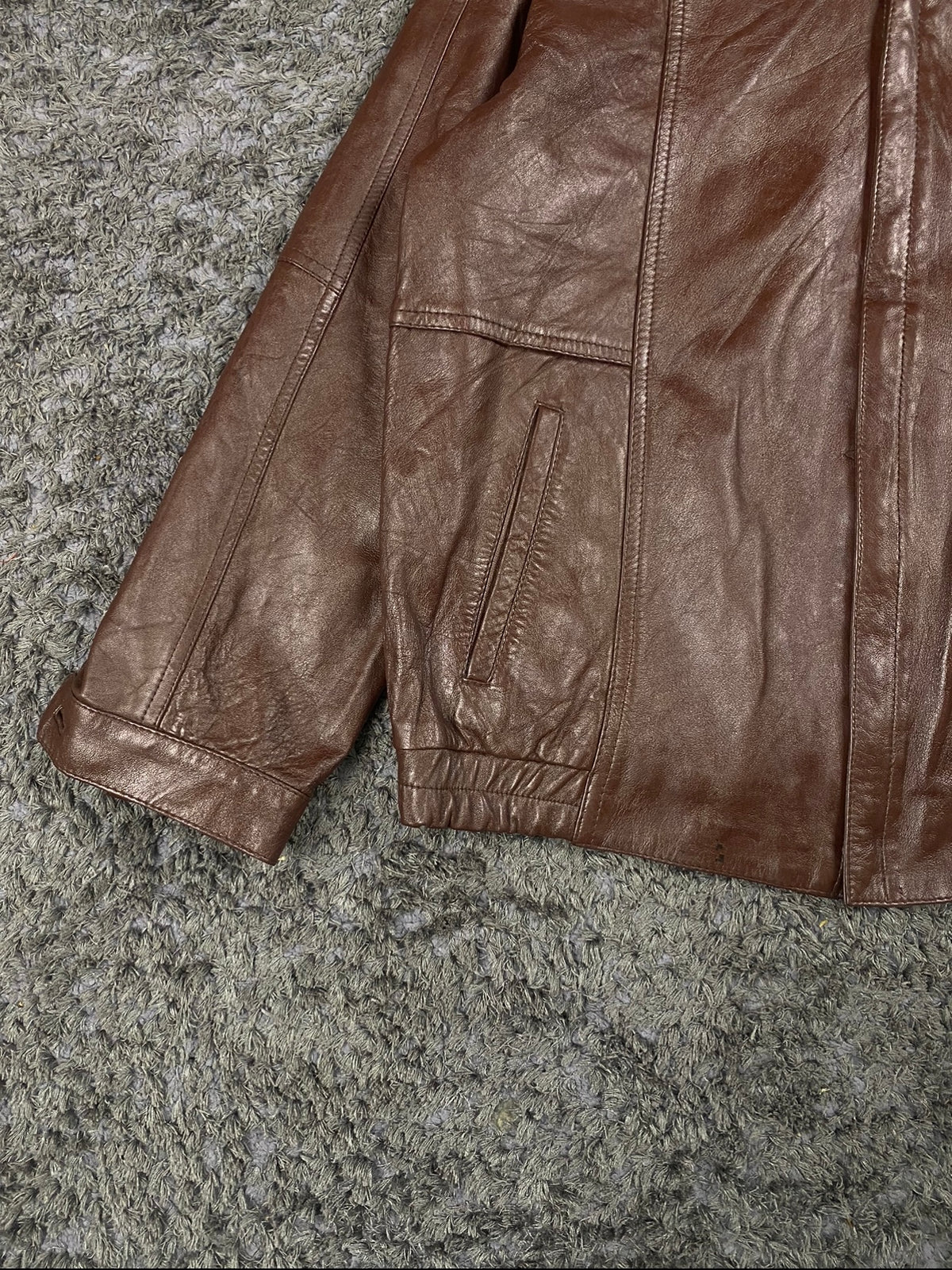 Olive green lining inside the brown leather cafe racer