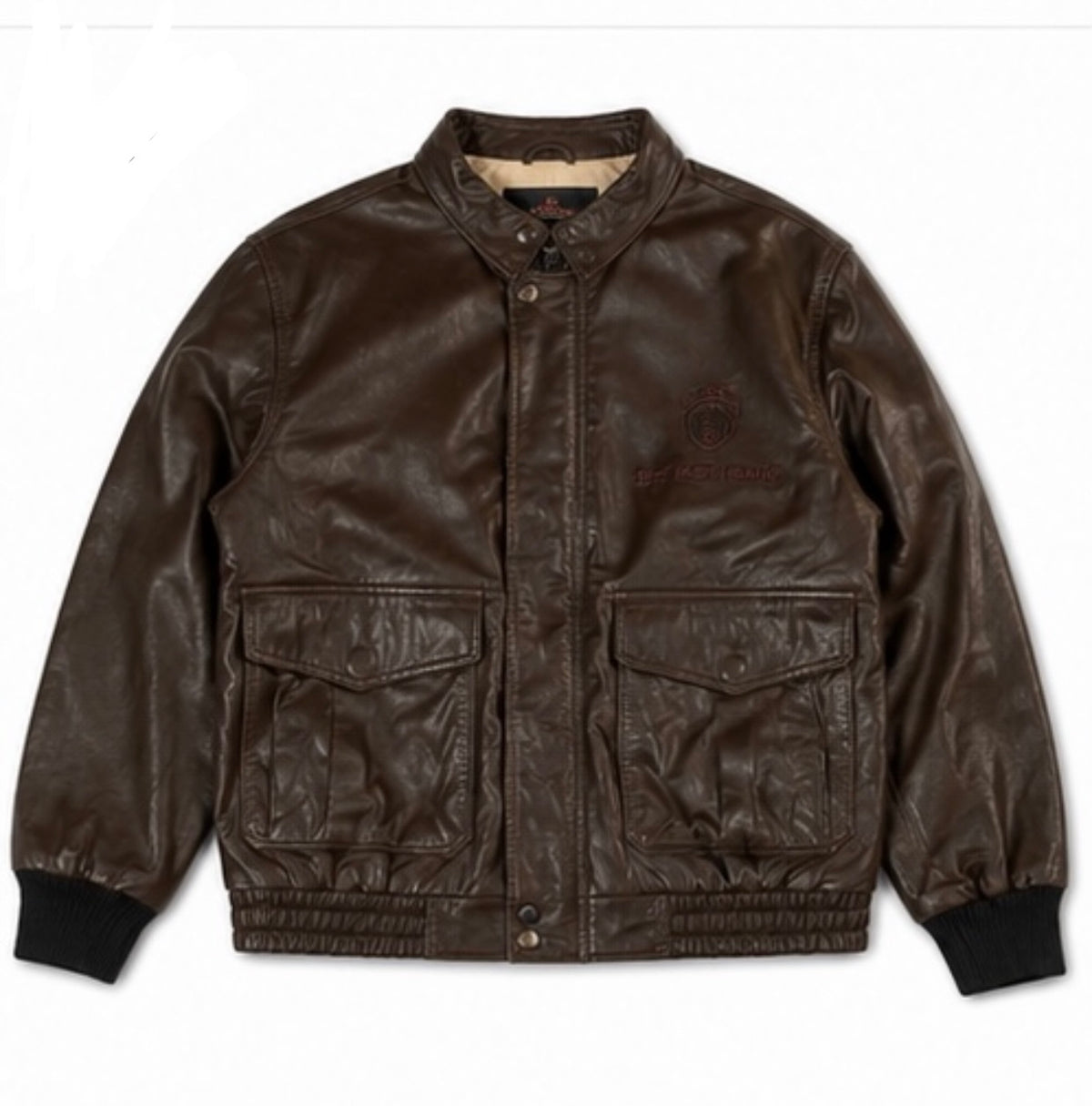 Brown leather flight jacket in size L shown from the front with twin flap chest pockets