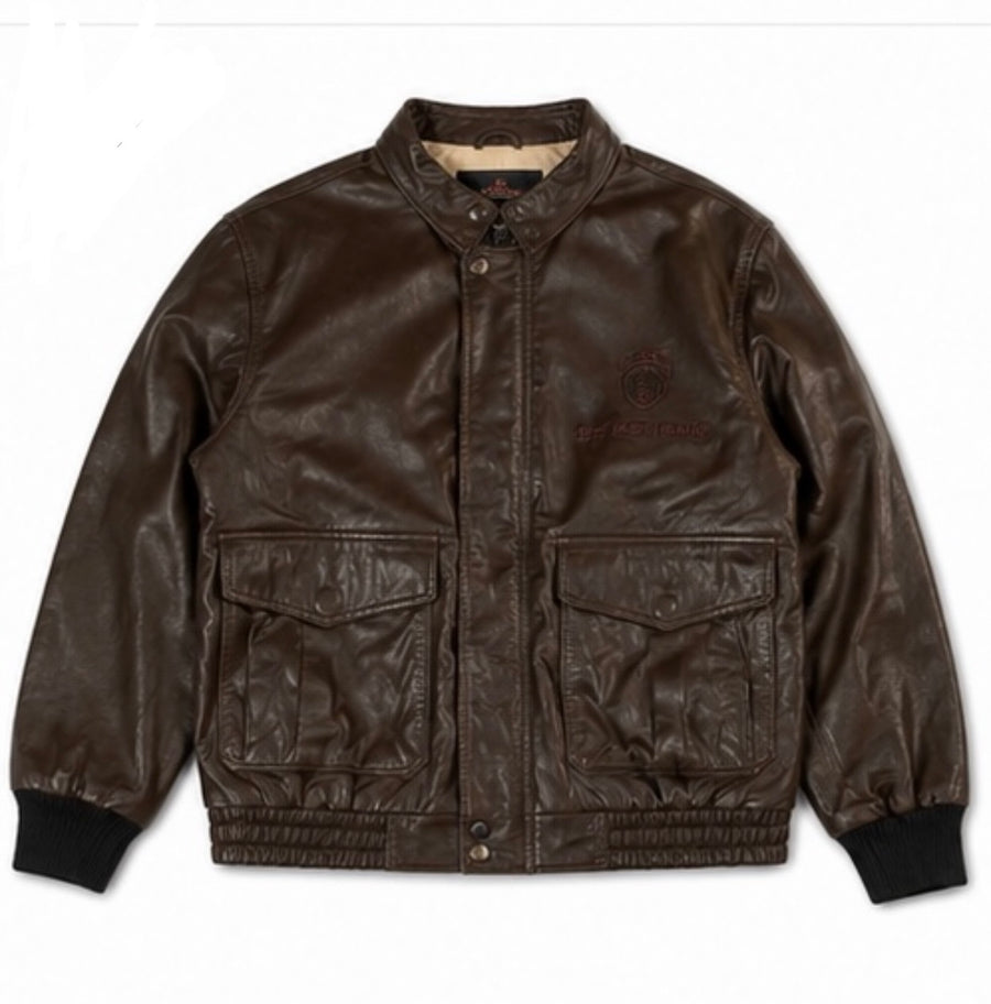 Brown leather flight jacket in size L shown from the front with twin flap chest pockets