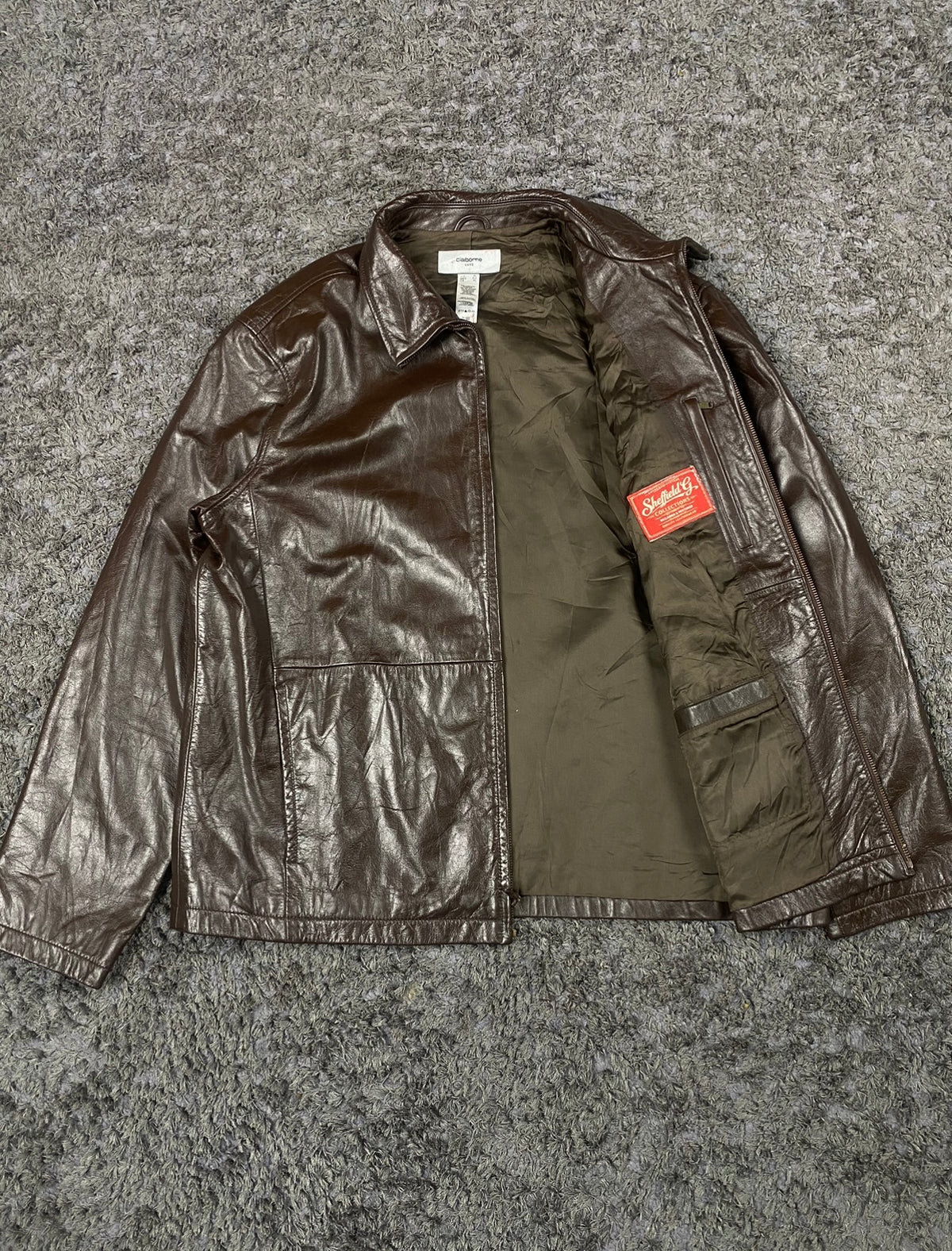 Brown real leather harrington with a 26 inch sleeve, size XL