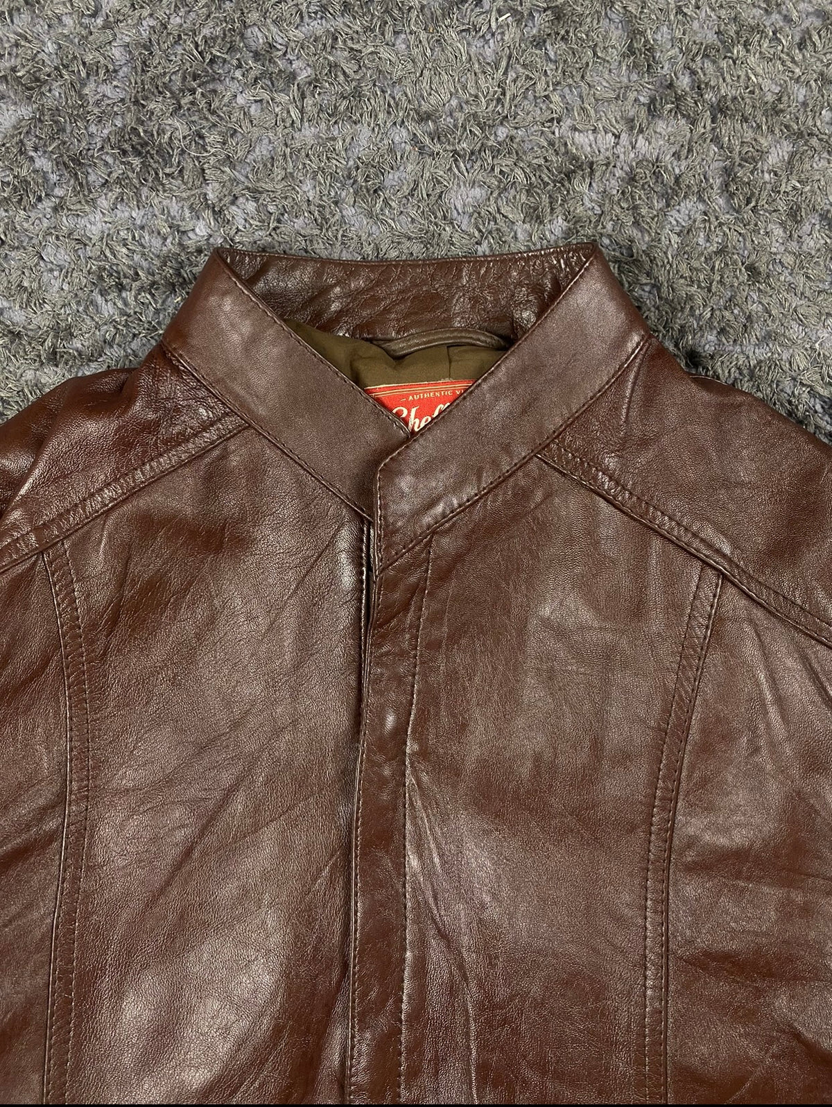 Size XL cafe racer in brown real leather with a 24 inch chest